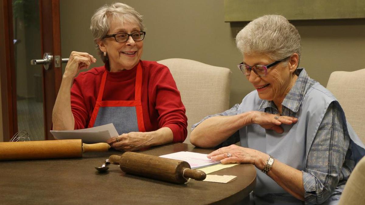Jan Meyer and Karen Cox share a laugh about kitchen disasters while recording 1851 Studio Chats at Tallgrass Creek in Overland Park.