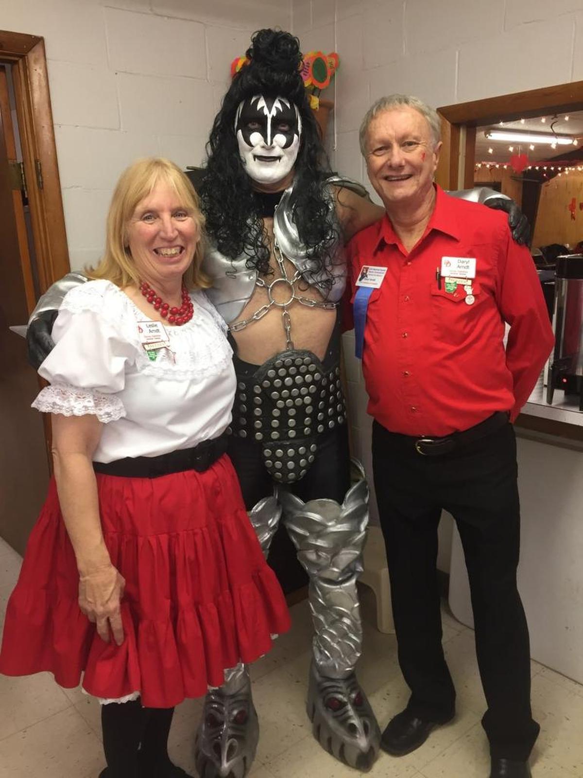 Daryl and Leslie Arndt, who are helping plan hospitality for the 67th Annual National Square Dance Convention at the Kansas City Convention Center were joined by a Gene Simmons impersonator at one of their club’s monthly dances. Arndt says their club dances to all kinds of music and has a theme each month to make the dancing more fun.