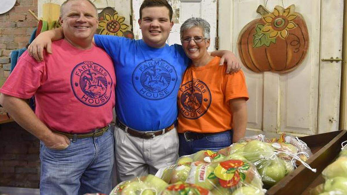 
David (left) and Peaches (right) Cunningham helped found The Farmer’s Market House to help children with disabilities, like their son, John David, 18. Last month, the family celebrated the grand opening of a downtown Weston location of The Farmer’s Market House.
