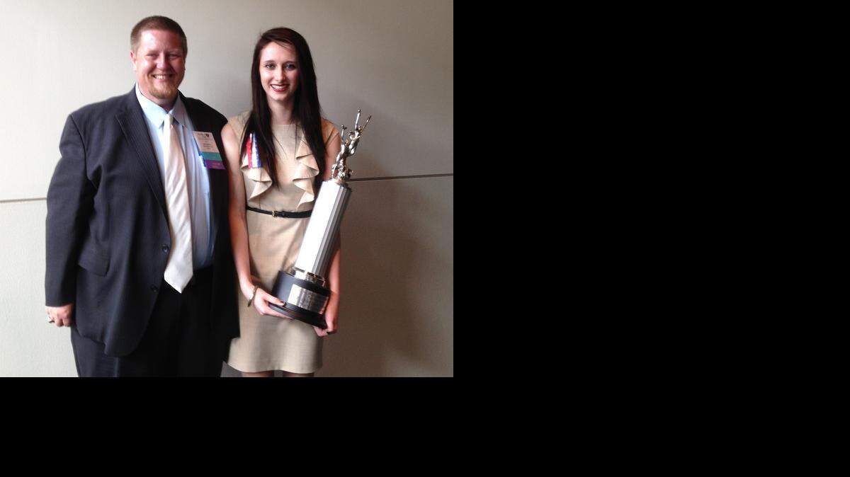 
Olathe Northwest High School Director of Debate and Forensics Josh Anderson and Alaina Walberg, a 2014 Olathe Northwest High School graduate.

