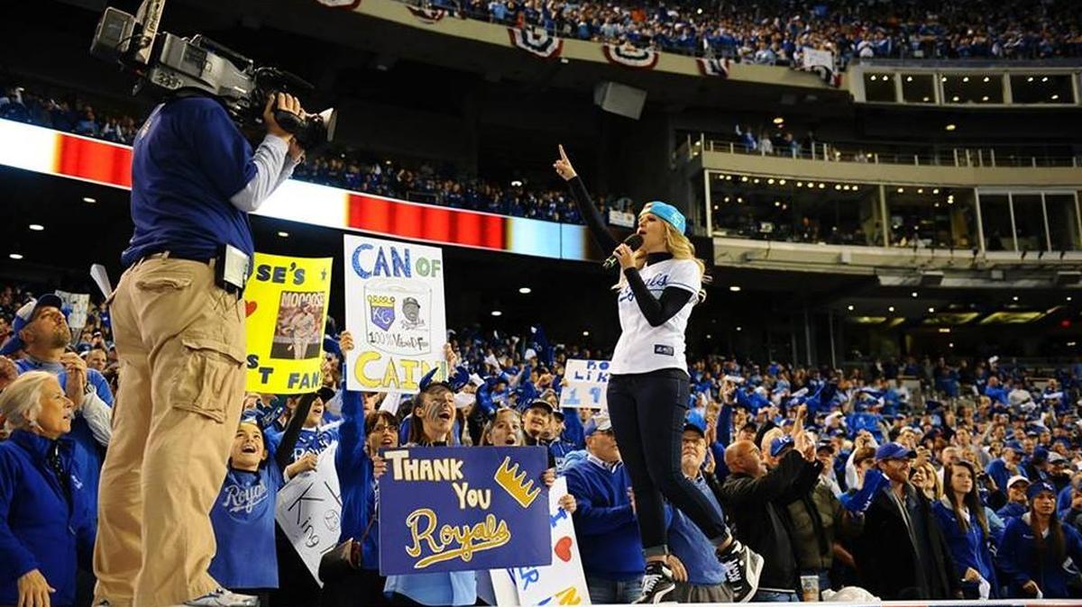 Danaya Roller fuels a Royals crowd with energy. Roller, a music teacher at South Valley Middle School, spends her summer as the pregame emcee for Royals games.