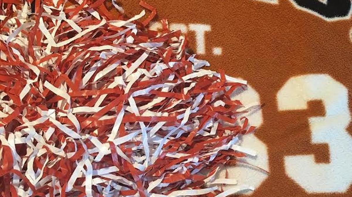 The “lucky” Texas blanket and cheer pom from the 2006 Rose Bowl game.
