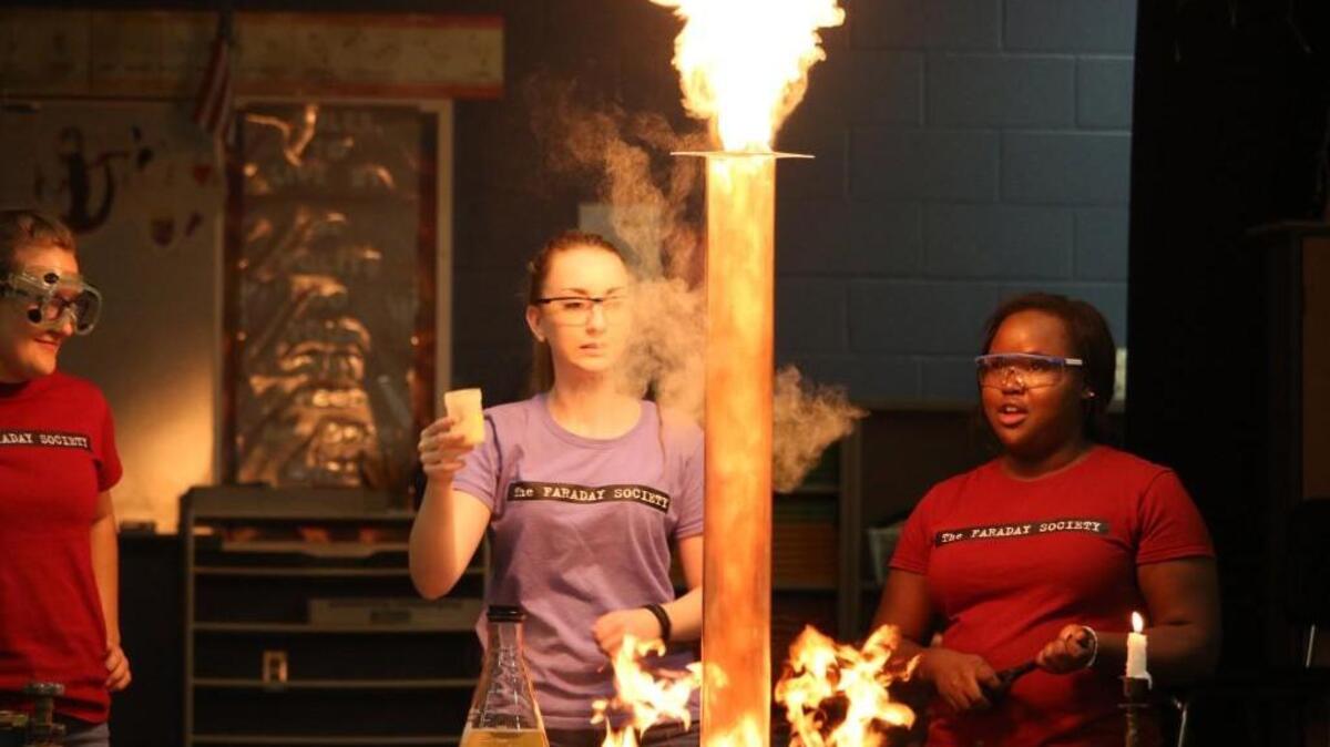 Faraday Society members Aubrey Holland, Ashley Howard and Shillan Thihithi gave a demonstration recently at Arbor Creek Elemetary School.