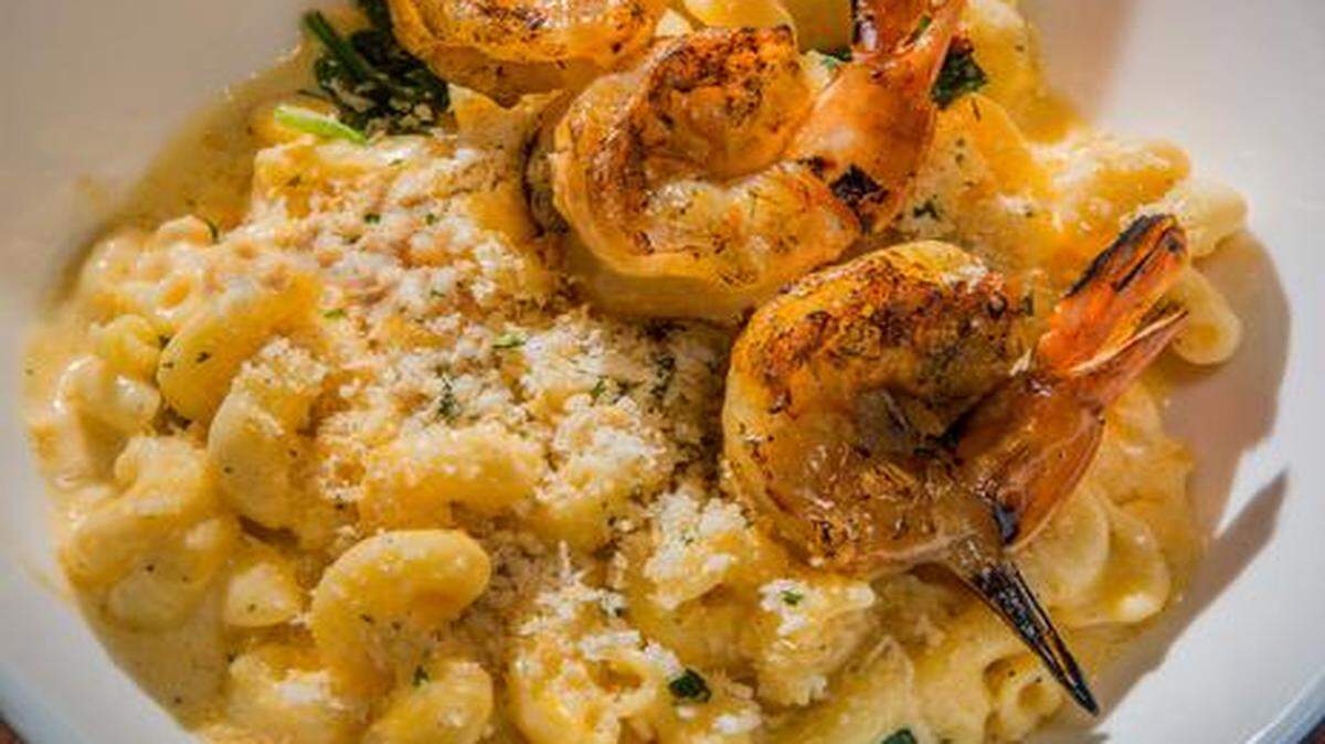 At the Blue Moose, one of the customizable mac and cheeses includes white truffle oil ($1.99). Add a skewer of wood-grilled shrimp for $4.99.