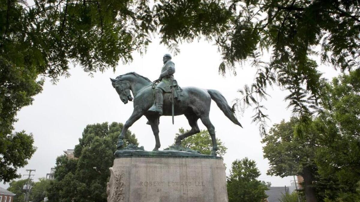 A statue of Confederate general Robert E. Lee sits in Emancipation Park, in Charlottesville, Va.