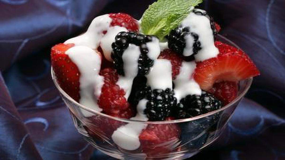 
Summer Berries With Yogurt Cream puts a healthy spin on a classic dessert.
