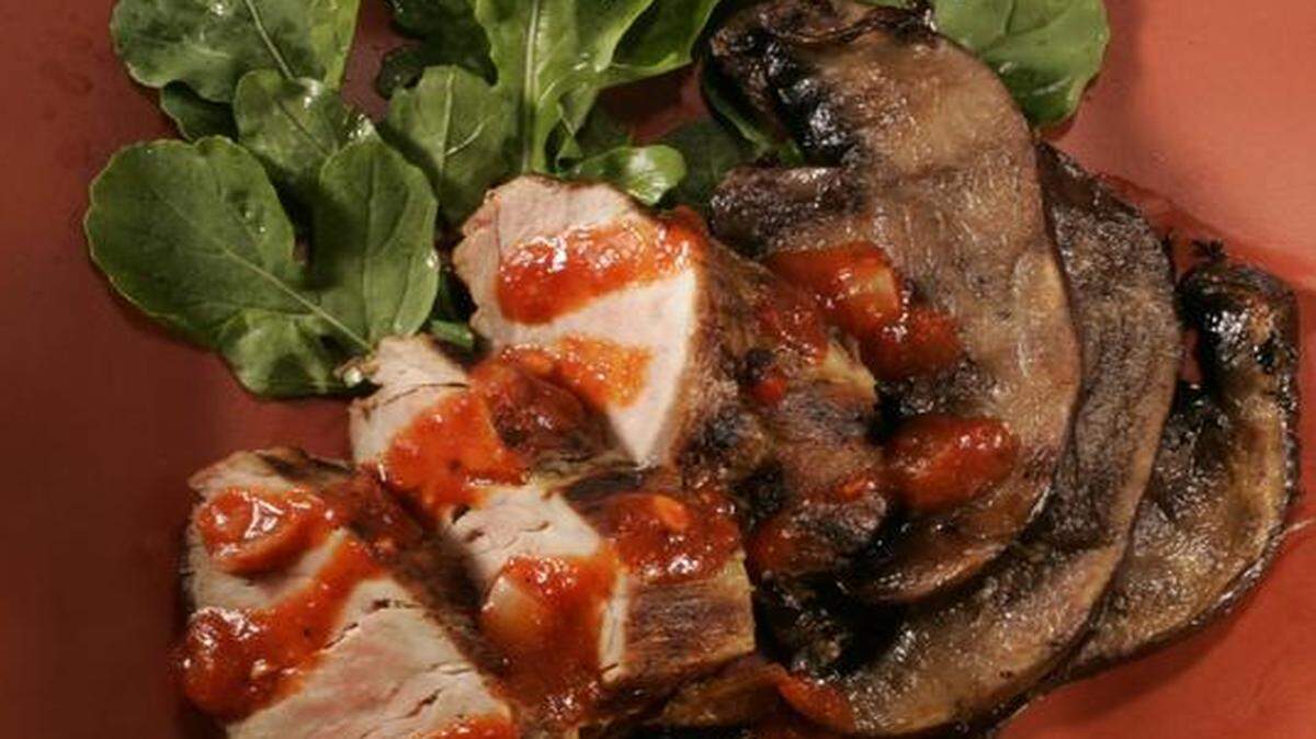 
Pork tenderloin pairs well with meaty portabella mushrooms and tangy red pepper coulis. 
