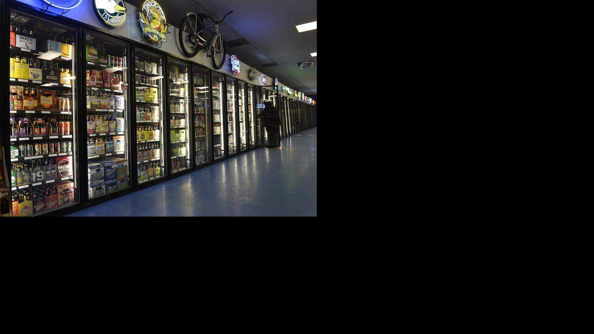
The owner figures that the beer coolers at Missie's Discount Liquors, 11938 Shawnee Mission Parkway in Shawnee, just might be the biggest around. More domestic beers line another wall.
