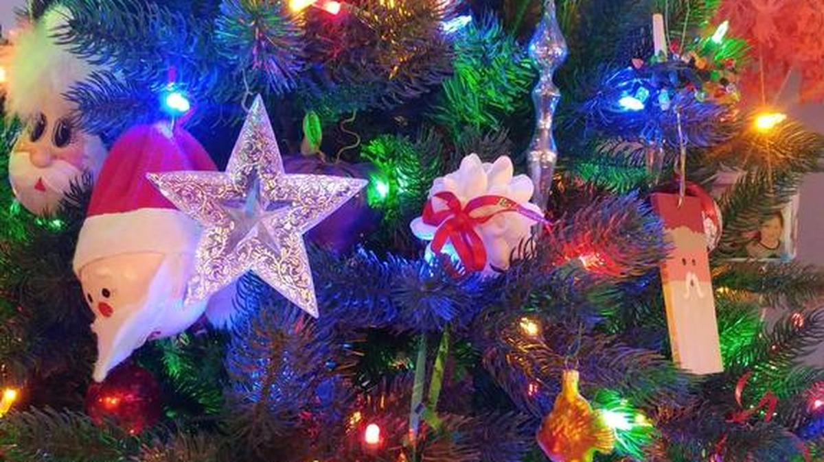 The Parnell Christmas tree is loaded down with treasured ornaments.
