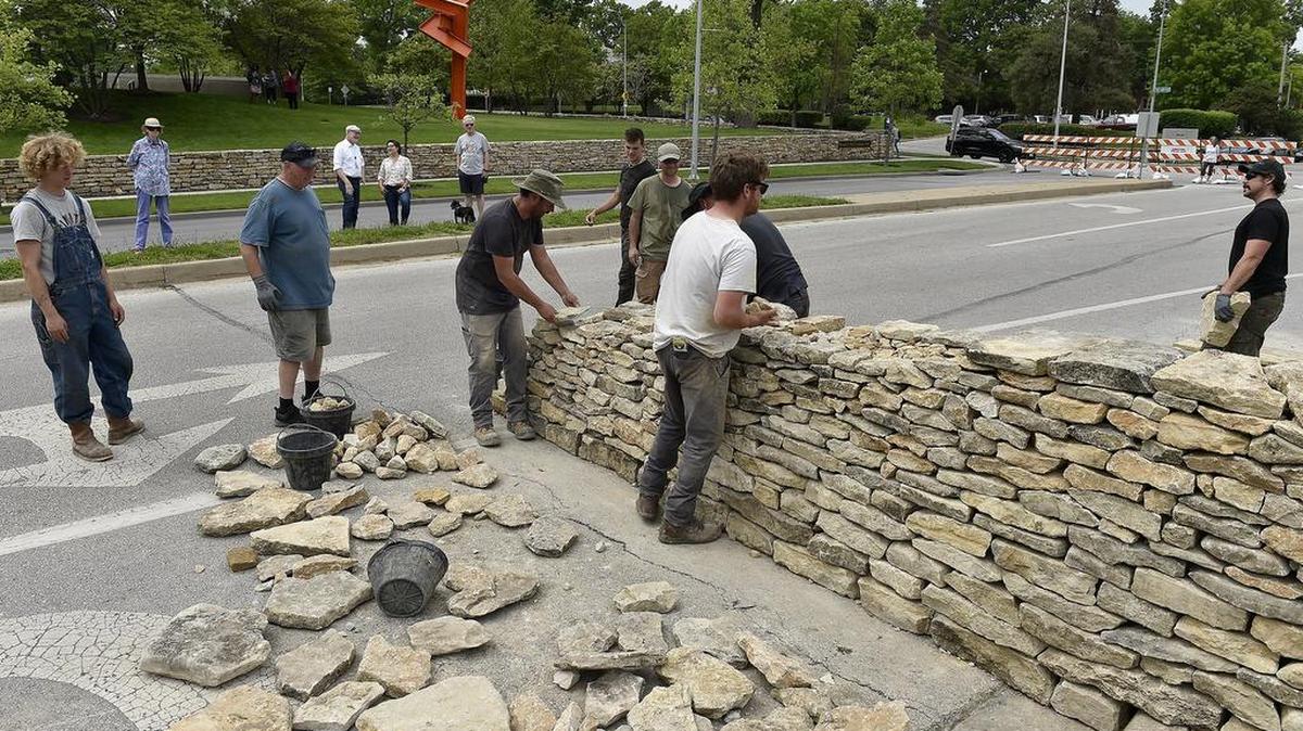 Artist Andy Goldsworthy’s “Walking Wall” began its gradual stroll across Rockhill Road on the east side of the Nelson-Atkins Museum of Art Wednesday, May 15.