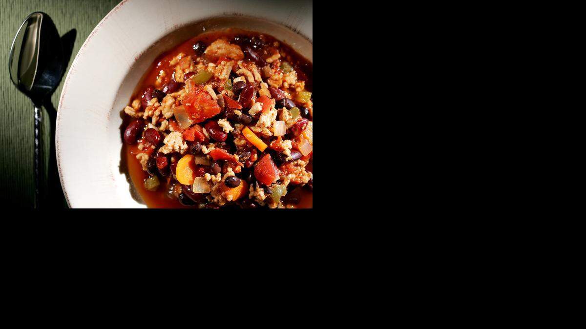 
Substitute ground turkey breast for ground beef to create a chili with plenty of protein but a lot less fat. 
