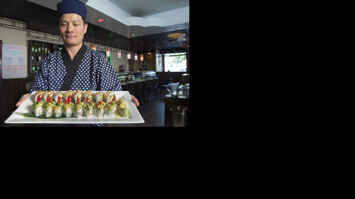 
Sushi chef Raymond Chen makes the Long Beach Roll (foreground) and lobster roll at Sushi Mido, 6010 Nieman Road in Shawnee.
