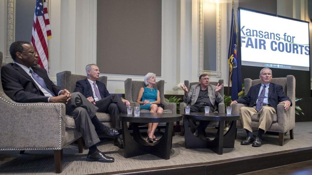 Moderated by Reggie Robinson (left) of the University of Kansas School of Public Affairs & Administration, four former Kansas governors — Republican Bill Graves (from left), Democrat Kathleen Sibelius, Republican Mike Hayden and Democrat John Carlin — recently began a campaign to retain Kansas Supreme Court justices.