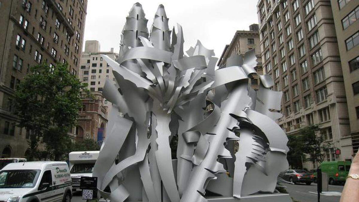 Albert Paley’s “Variance,” displayed last year in New York, will be placed in the median of Tomahawk Creek Parkway in Leawood.<252><137>Albert Paley constructed “Variance”, a 17’ high X 12’ wide X 3’ deep, stainless steel piece, as one of 13 pieces that was be exhibited on Park Avenue in New York City, said April Bishop, the city’s cultural arts coordinator. This artwork is intended to be centerpiece of the city’s Sculpture Garden. The Paley piece would significantly advance the importance of the city’s collection as Paley pieces can be found in permanent collections of major museums and corporations throughout the world, Bishop said.<137><137><252><137>