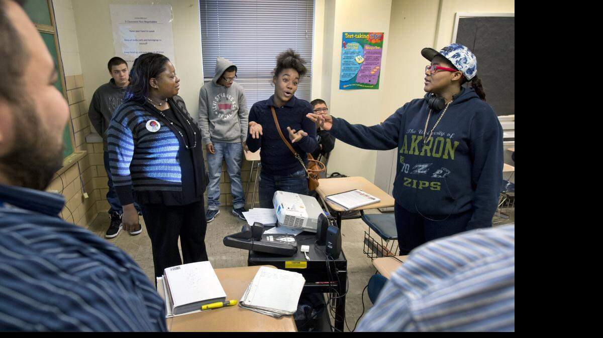 
The new Heartland 180 Degrees program being held at Northwest Middle School in Kansas City, Kan., is helping students increase personal responsibility, develop healthy goals and reduce at-risk behavior. Students including Keisha (center), 14, and Lestoria (right), spoke during an exercise with facilitator Rebbecca Johnson on how thoughts, beliefs and values affect choices.
