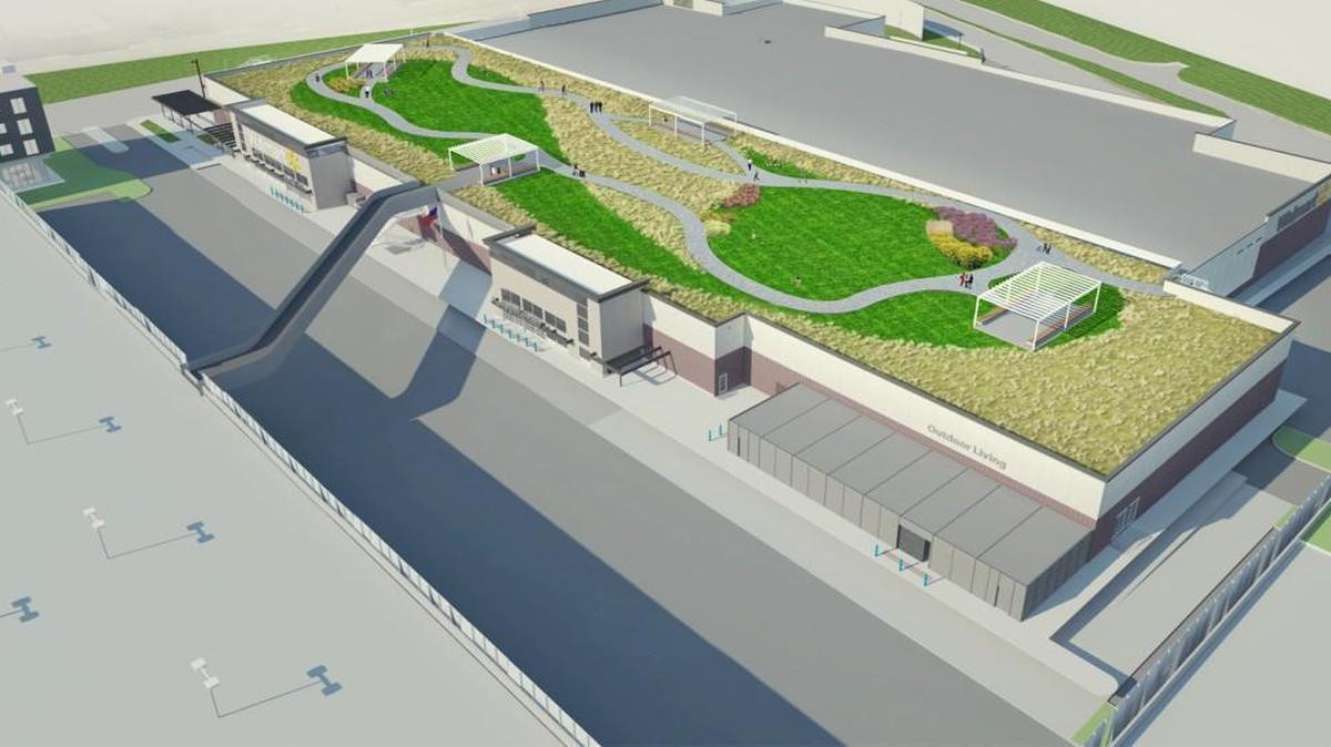Green space atop the Wal-mart in the Mission Gateway project aims to make it more aesthetically pleasing.