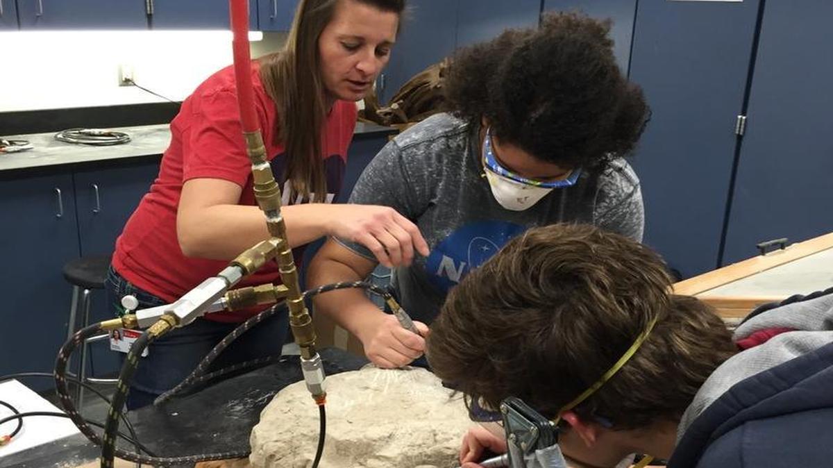 Marsha Skoczek of Olathe North High School recently worked in the paleontology lab with members of an Advanced Geoscience I class.