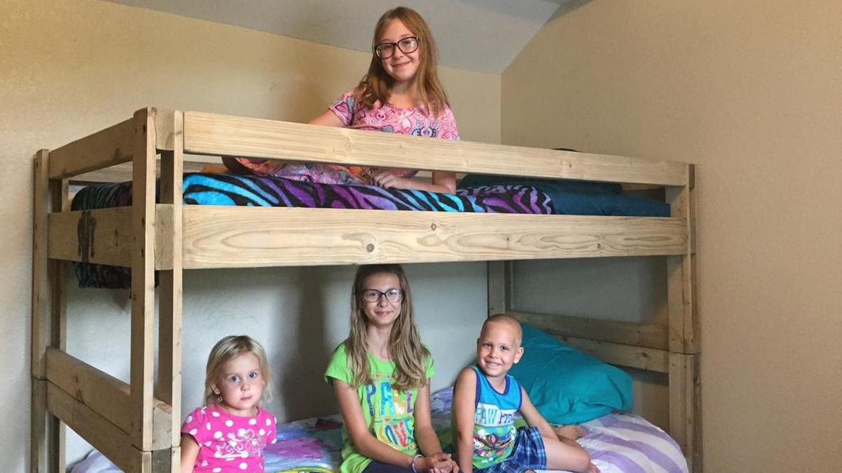 Gardener children Mariah Peterson, top bunk, and bottom bunk (from left) Mycala Peterson, Evangeline Peterson and Elijah Peterson are pictured on one of the bunk beds built for them