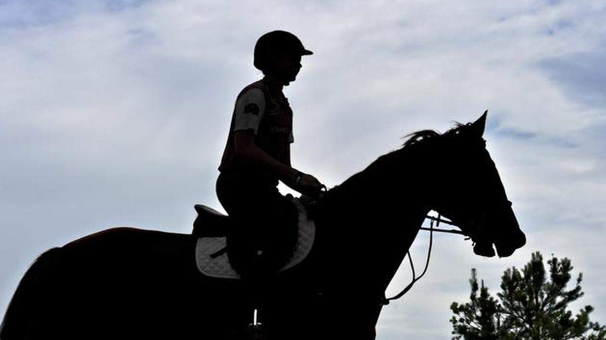 
Hunter Holloway, 16, exercised a horse named Dublin at Equi-Venture Farm in Topeka. 


