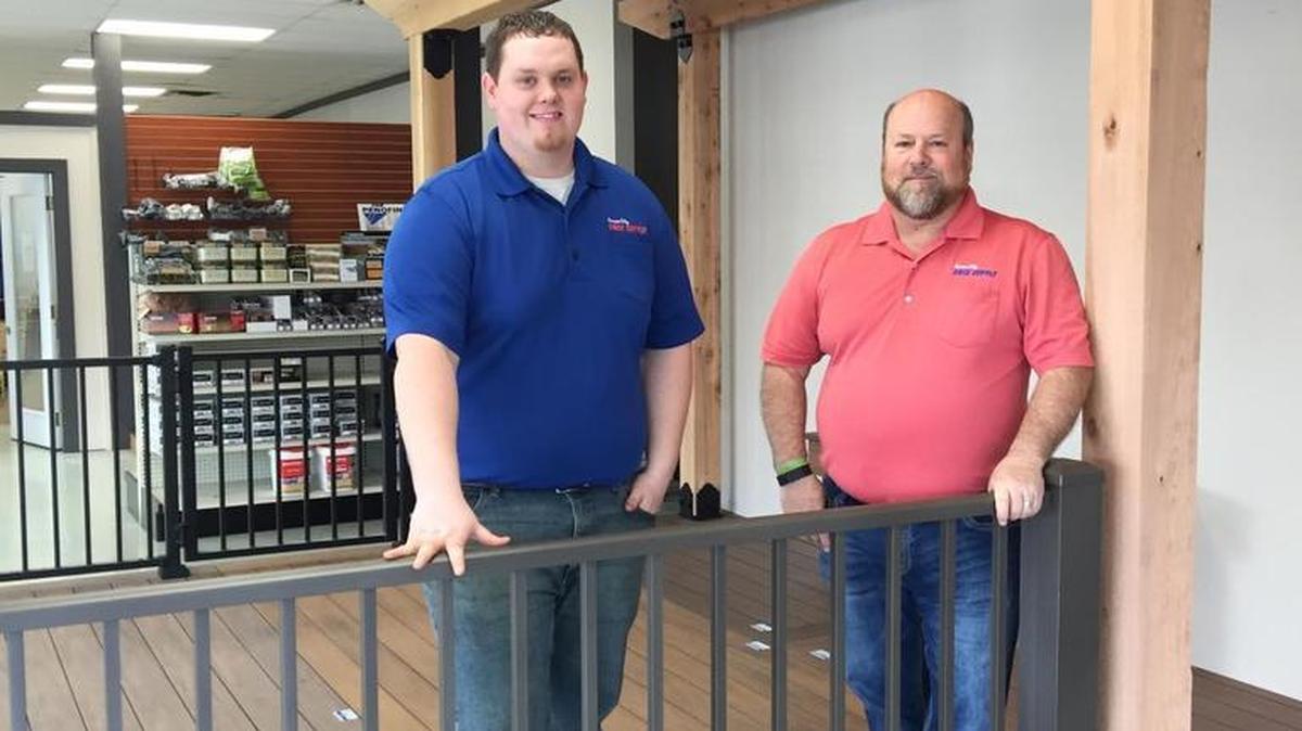 Jordan Smith (left) manages Kansas City Deck Supply in Overland Park. His father, Tom Smith, co-founded the company in 2003.