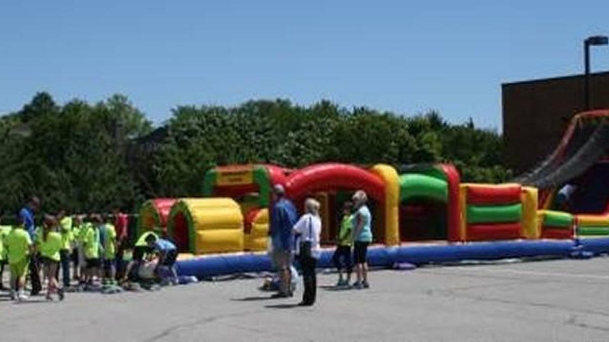KidZone Kansas City offers a variety of entertainment options, including water slides and carnival games, tables and tents.