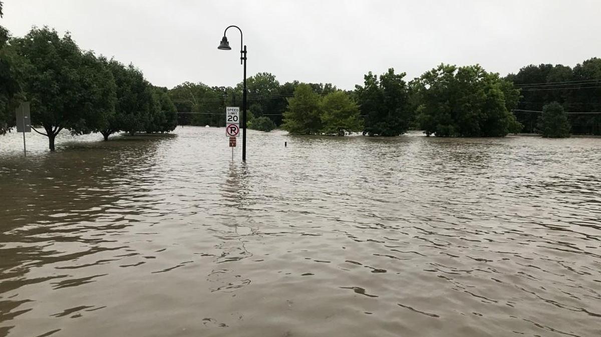 In addition to the Leawood city park, 30 residential and commercial structures flooded on July 27. Water reached the rim of the basketball goals located within the east side of the park on Lee Boulevard.