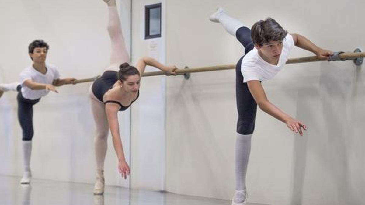 
Oscar Garcia (right) worked on movements during a monthlong summer program for ballet students from Cali and Bogota, Colombia, at the Kansas School of Classical Ballet in Overland Park.

