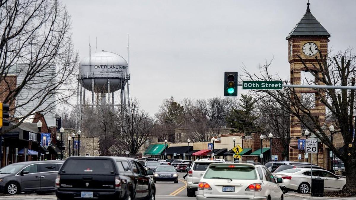 The Overland Park water tower and the Santa Fe clock tower hang over Santa Fe Drive near 80th Street.