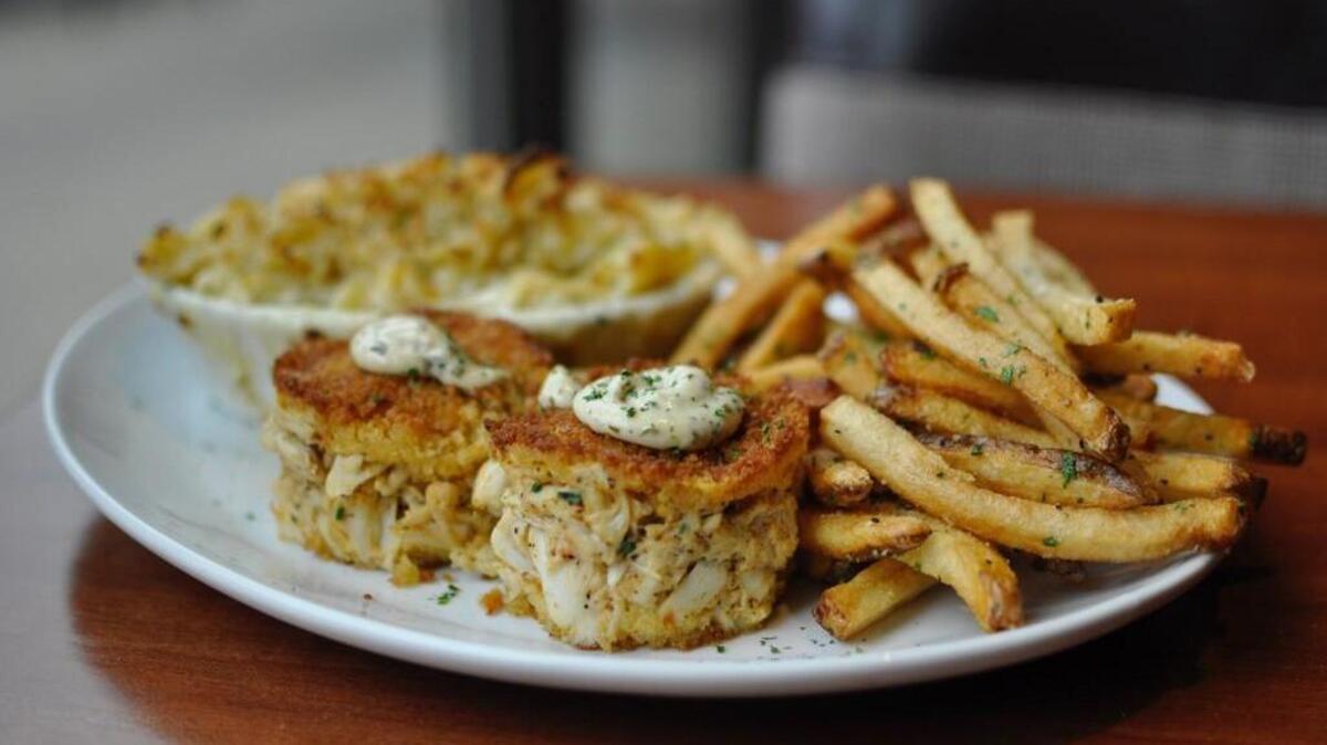 The Grille at Park Place’s jumbo lump crab cakes entree comes with two sides, such as gourmet mac and cheese and hand-cut fries.