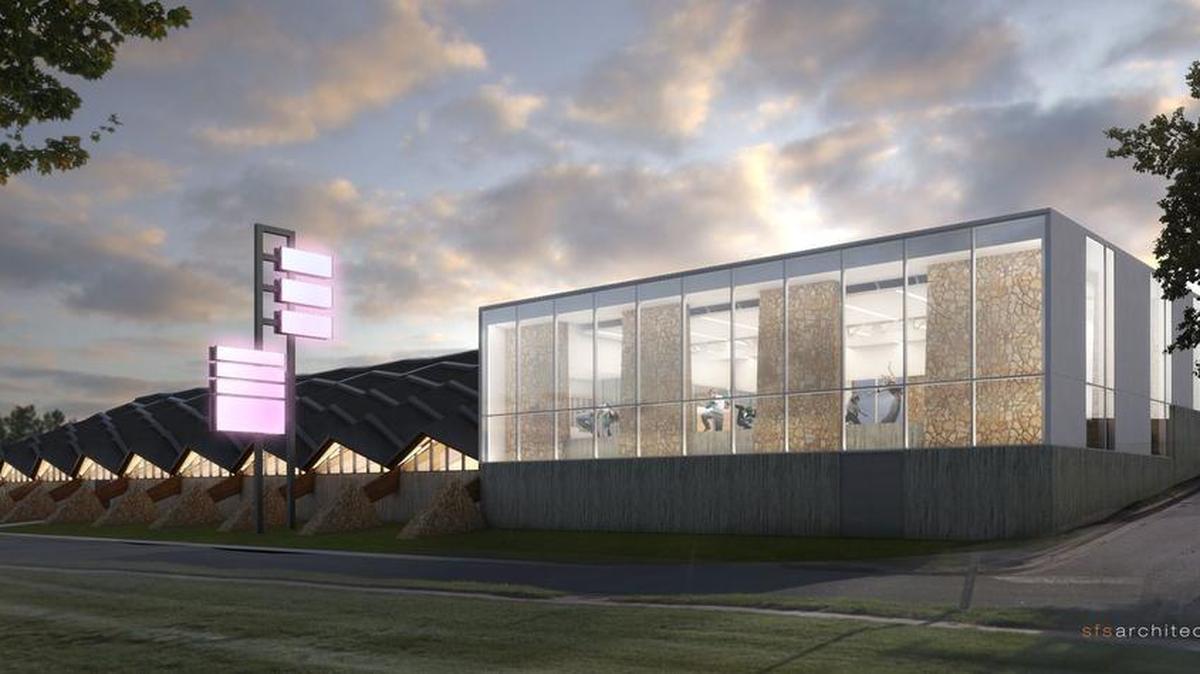 
Designers from SFS Architecture unveiled their initial renderings Thursday for the transformation of the vacant former bowling alley and ice rink into the Johnson County Arts and Heritage Center. Architects suggested large glass windows interspersed with the stone work on two sides to allow visitors to see up and into the building at night. More windows on the east side would give the building an inviting, “jewel box” effect, said designer Derek McMurray, who presented the plan.
