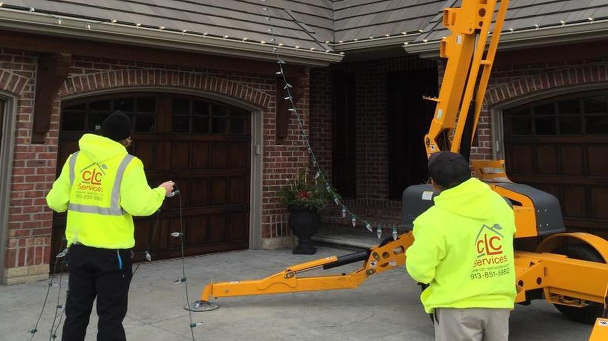 CLC employees add holiday lights on about 200 homes this year