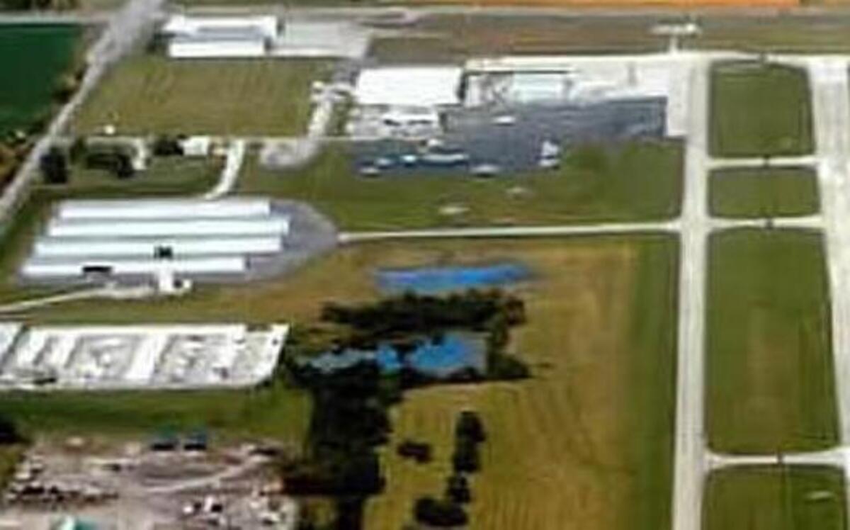 Landowners near the New Century AirCenter have filed suit, not happy that a cold-storage facility is planned for their homes near the Gardner airport.