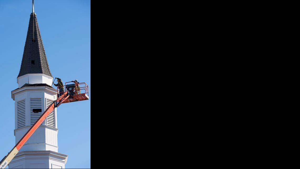 
A new steeple will be built on top of the new welcome center at Village Presbyterian Church using the metal spire from the top of the old steeple. Crews worked last Wednesday at the church, 6641 Mission Road.


