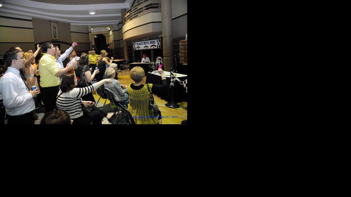 
A fund-raising event is a black tie parody where attendees where jeans and T-shirts instead of formal wear.
