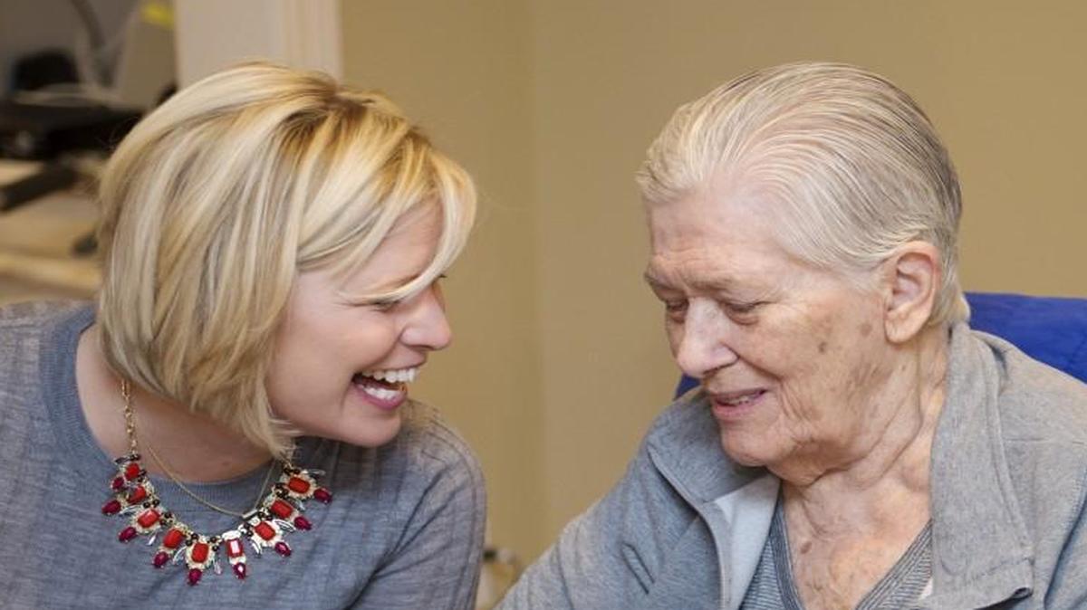 Prairie Elder Care in south Overland Park is a senior group home helping residents with memory issues. It’s set in a residential neighborhood and aims to provide more personalized care. Michala Gibson (left), a registered nurse and co-owner of Prairie Elder Care, shares a happy moment with Arlene Fitzsimmons during a recent lunch.