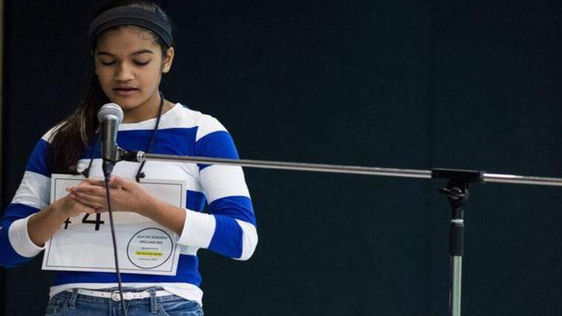 
Vanya Shivashankar, an eighth-grader at California Trail Middle School, spelled a word Thursday in the Olathe Public Schools Spelling Bee at Frontier Trail Middle School. Vanya repeated as the Olathe champion and will return to the National Spelling Bee in May.
