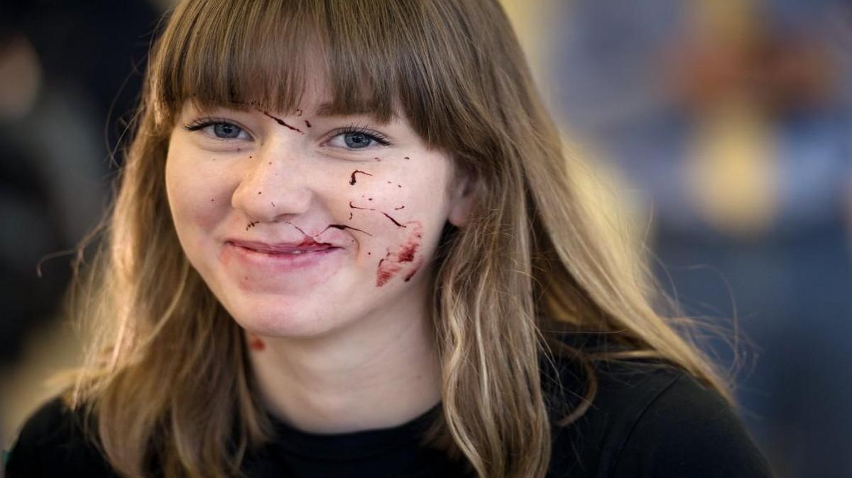 A couple of Johnson County school districts are adding a public safety curriculum, with an eye on careers in firefighting, emergency response and policing. In the Shawnee Mission district, the program is called Project Blue Eagle. Recently at Shawnee Mission South, a mass exercise was held to simulate a school shooting. Playing the part of a victim was Heather Overman, a junior.