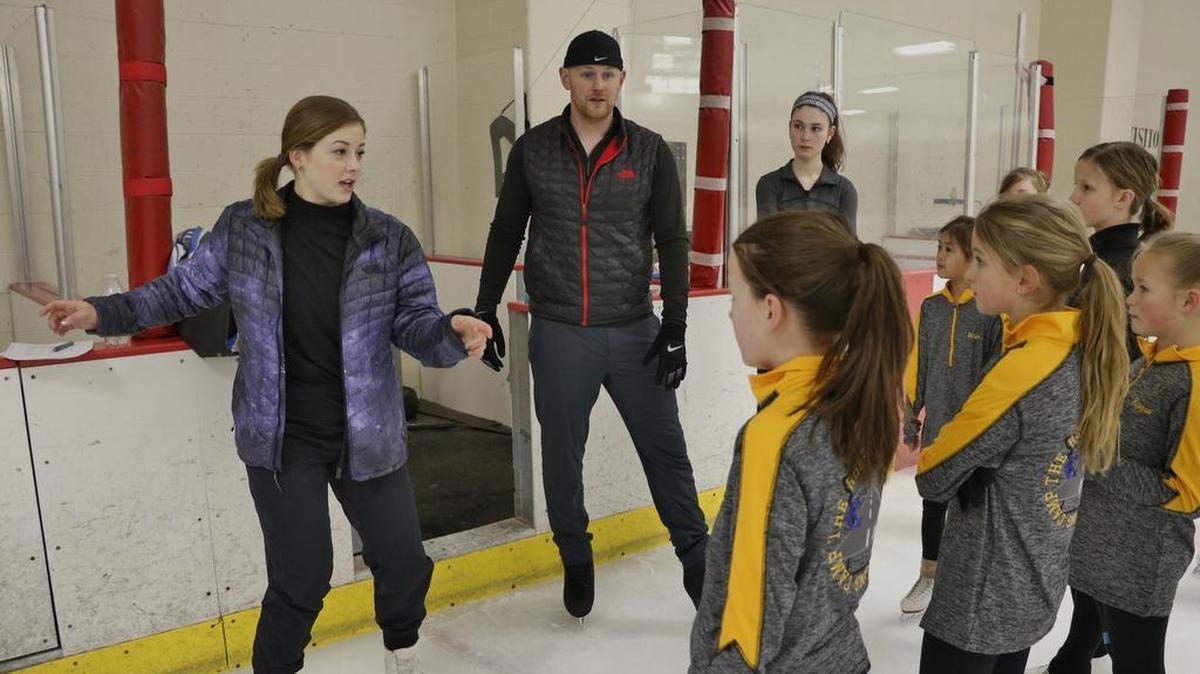 Olympic bronze medalist Gracie Gold (left) and former U.S. pairs champion John Coughlin discussed spin techniques with participants at the two-day Road to Gold Training Camp last year at the Line Creek Ice Arena. Organized by Coughlin, the clinic offered participants the chance to learn championship-level practices and techniques.