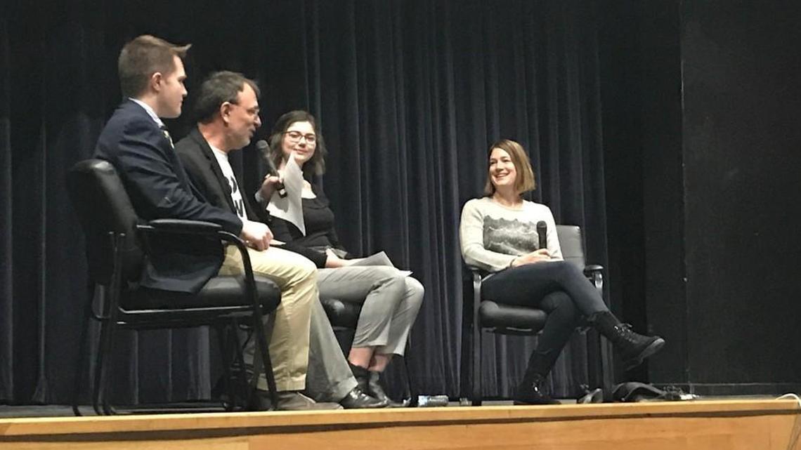 “Gone Girl” author and Kansas City native Gillian Flynn (right) answers a question from her former teacher Craig Ewing during Flynn’s visit to Saint Thomas Aquinas High School on Friday.