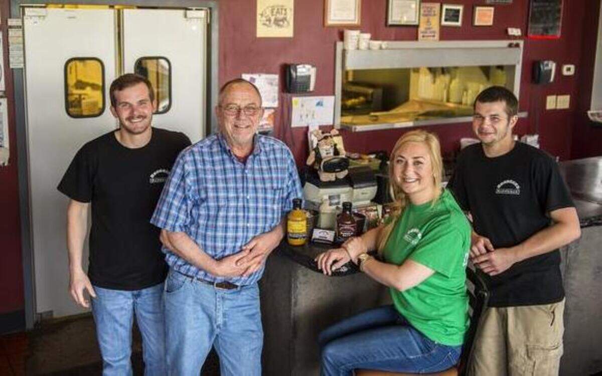 
The team at Brobeck’s Barbeque, located at 4615 Indian Creek Parkway, includes Dave Brobeck (from left), owner Doug Brobeck, manager Becky Riley and Dean Brobeck.
