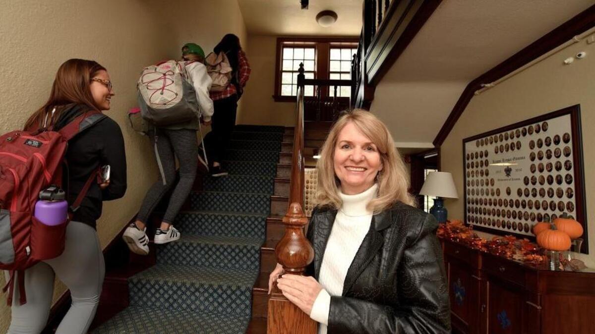 As house director of the Kappa Kappa Gamma house at the University of Kansas, Teri Bloomer watches over her sorority girls with a loving eye. Story, Page 4.