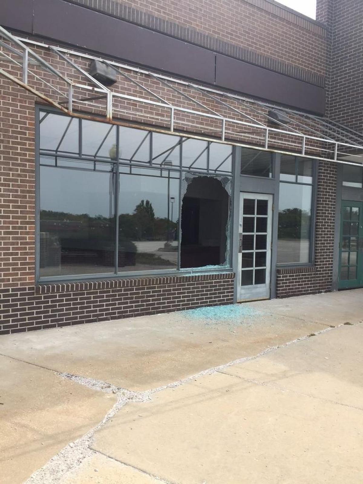 The deteriorating Westbrooke Village Shopping Center has been marred by broken windows and graffiti. Developers have since replaced all of the windows on the property at 75th Street and Quivira Road. 