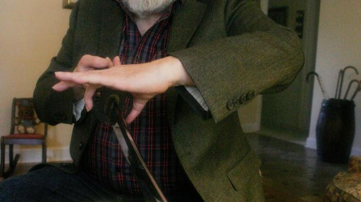 
Earle Brigance of Mission displays his prized samurai sword.
