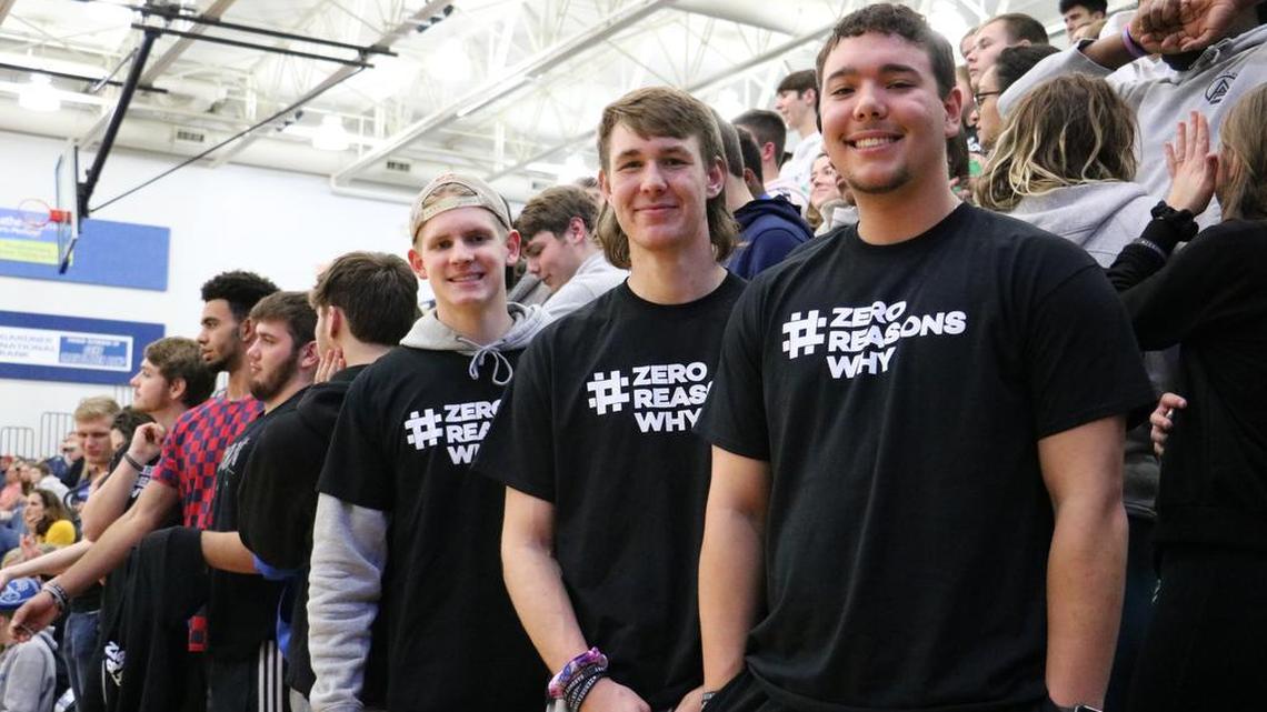 Fans wore Zero Reasons Why shirts during varsity games between Gardner Edgerton and Shawnee Mission West high schools.