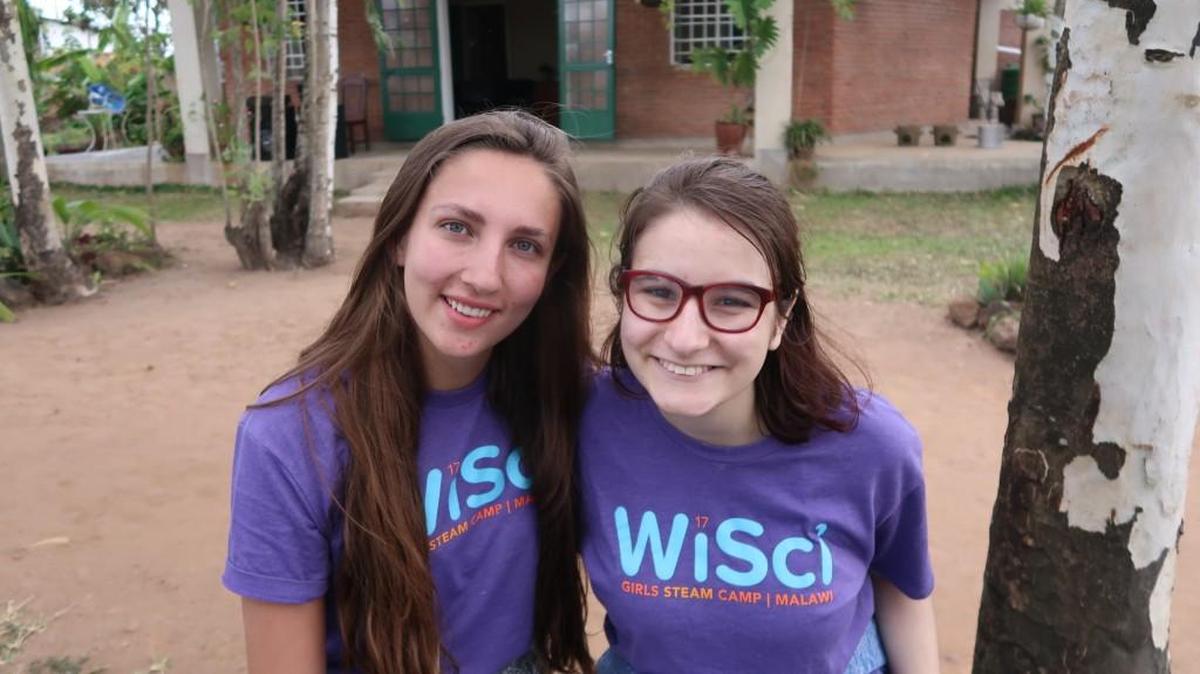 Notre Dame de Sion senior Meg Schwartz (left) and Bishop Miege senior Ruby Rios at the Green Malata Entrepreneurial Village in Malawi. Schwartz and Rios were among 20 U.S. students chosen from 1,100 applicants for a weeks-long WiSci STEAM camp last summer that empowered women to explore science and technology fields.