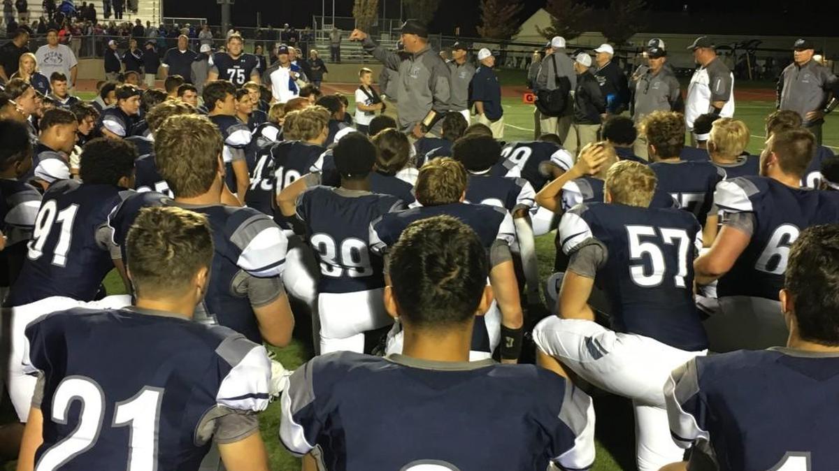 Lee’s Summit West football coach Vinny Careswell addressed his team after the Titans’ 37-30 double-overtime victory Friday, Oct. 20, 2017, against Raymore-Peculiar in a Class 6, District 4 playoff action.