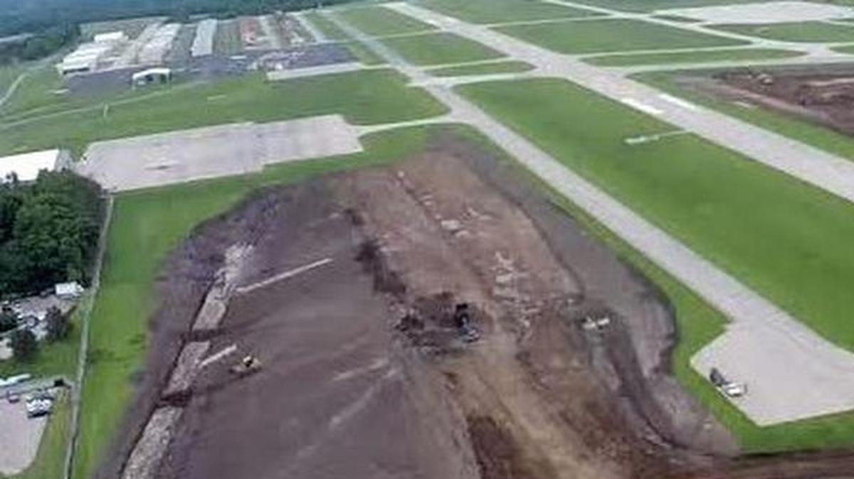 An aerial view of Lee’s Summit Municipal Airport is shown from the south end where earthwork was being completed in preparation of extending the runway and adding a new taxiway in this photo from earlier in 2017.