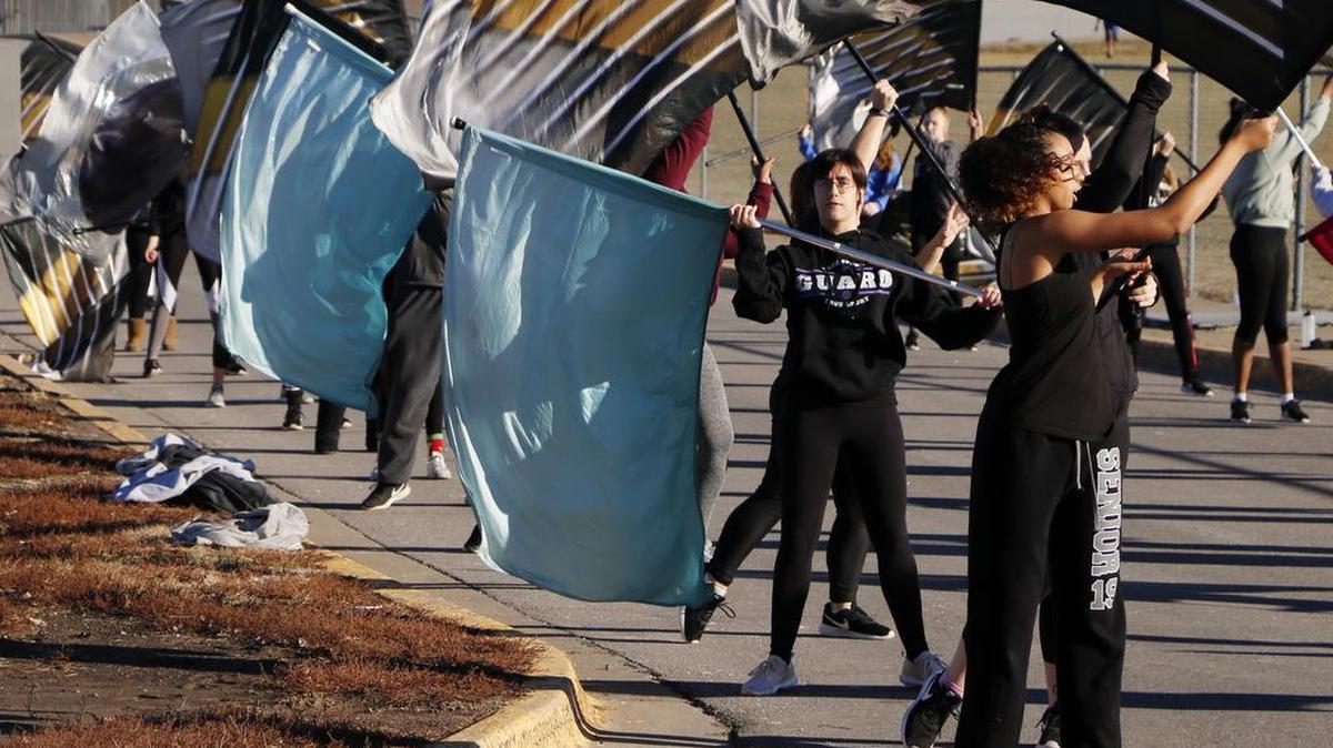 Members of the Lee’s Summit R-7 marching bands’ color guard rehearsed for their Dec. 29 performance in the Orlando Citrus Parade.