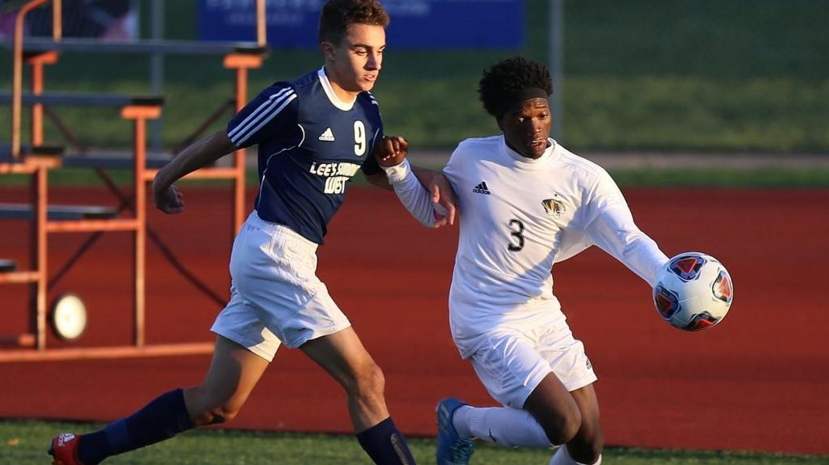 Noah Jenkins (left) and his Lee’s Summit West boys soccer team battled Keenan Johnson and Lee’s Summit twice during the regular season, but the two teams may only see each other once next season after the Tigers were moved from the Suburban Conference’s Gold Division to the Red Division for schools with smaller enrollment.