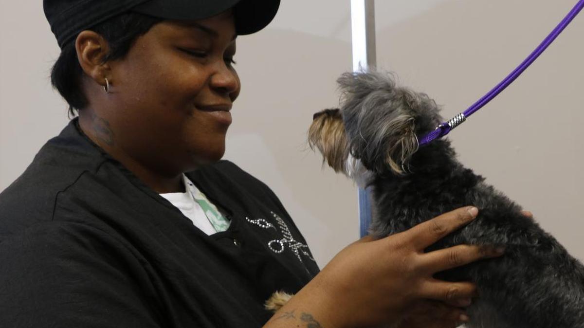 Christine Banks, of Kansas City shared a sweet moment with her client, Lily Bella. The Salon is managed by Banks and other graduates of The Grooming Project, a professional dog grooming school and pilot program of the Kansas City-area nonprofit, Empowering the Parent to Empower the Child.